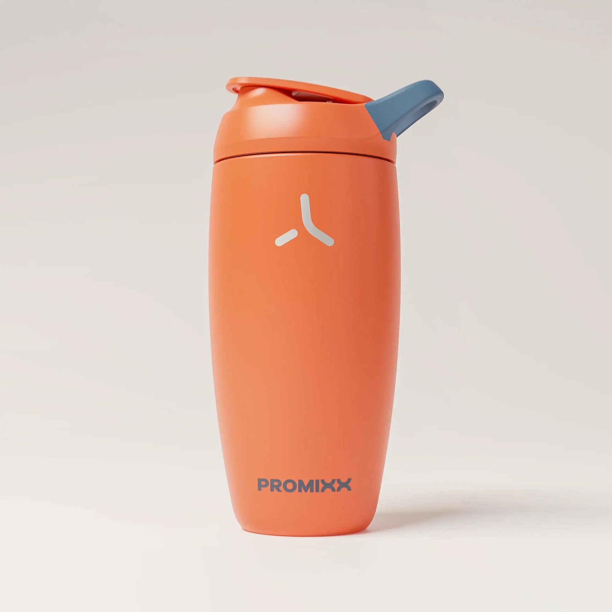 insulated-performance-shaker-bottle-y5 SHKR_18550_dwSS-S1.1_burntOrange_midnightBlue_1_1_hero_edit_98573fa4-4557-4dbd-9f16-b284eece3df3.png